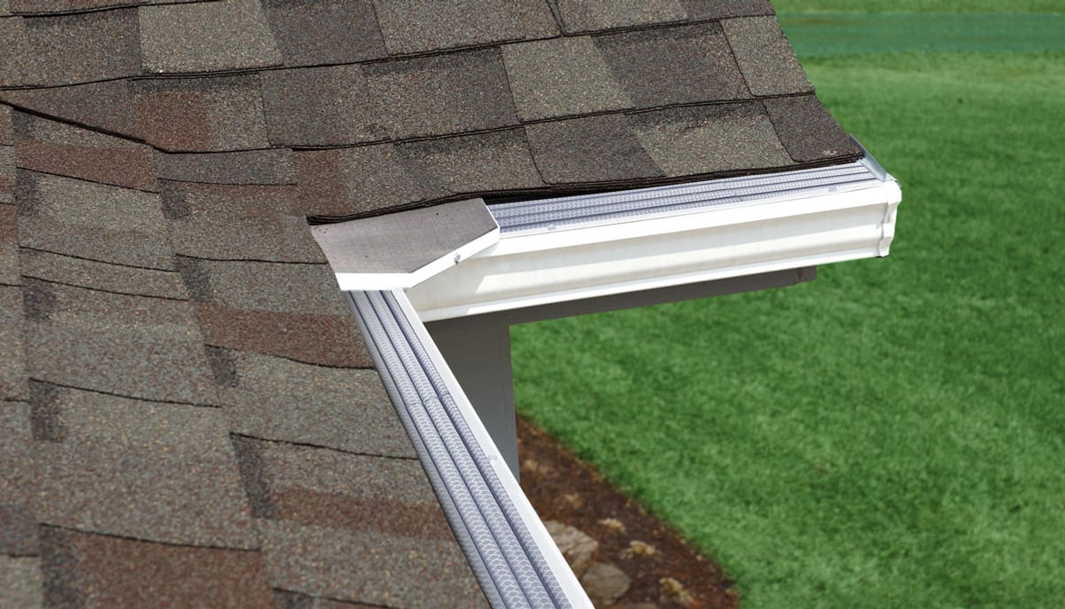 Leaf Solution gutter guard inside miter in white, fitted at a gutter corner